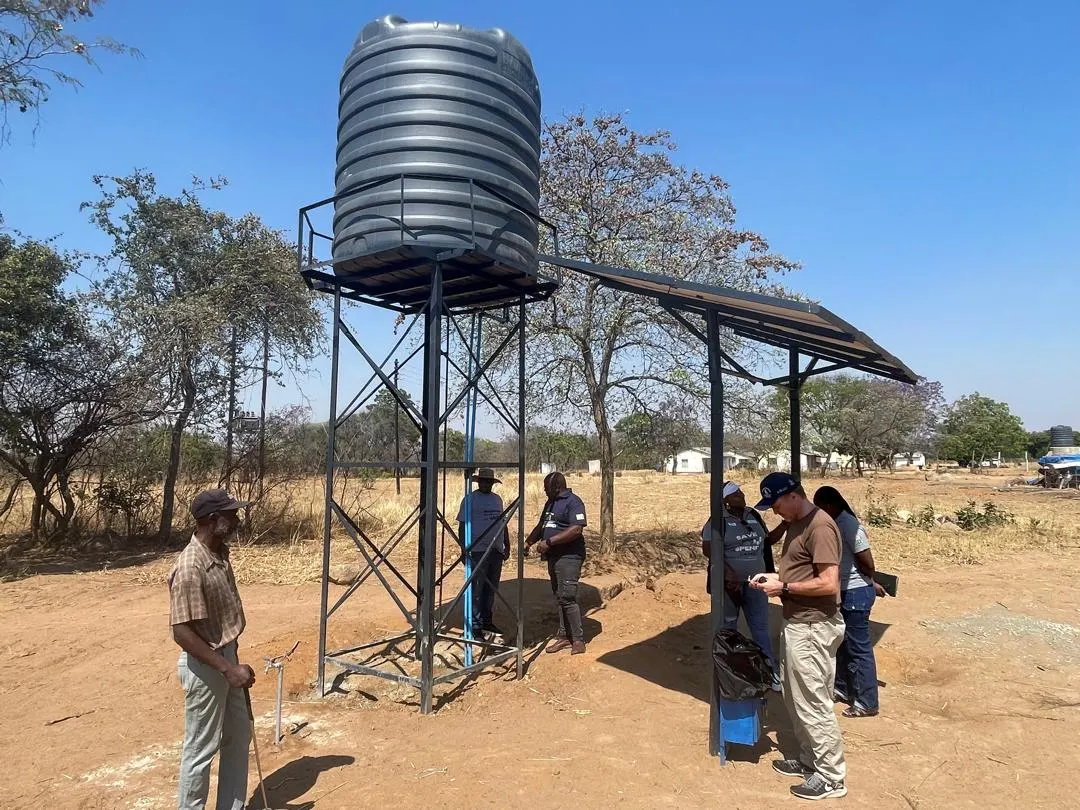 A water tank with solar panels at a school in Zimbabwe.
